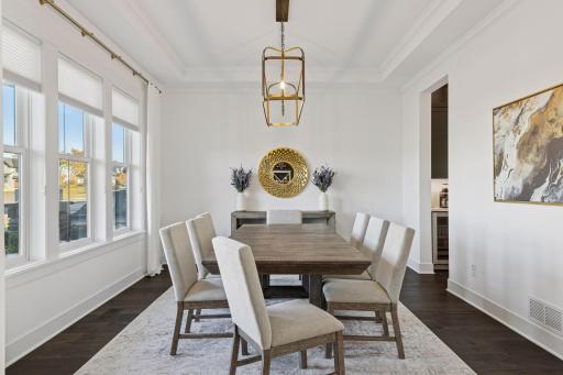 The formal dining room sets the tone for a warm welcome and memorable gatherings.