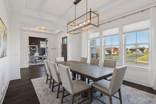 The formal dining room sets the tone for a warm welcome and memorable gatherings.