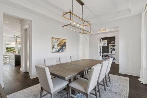 The formal dining room sets the tone for a warm welcome and memorable gatherings.