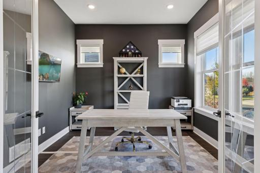 Inside, natural light pours through expansive windows seamlessly blending modern luxury with classic charm.