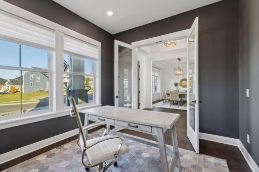 Inside, natural light pours through expansive windows seamlessly blending modern luxury with classic charm.