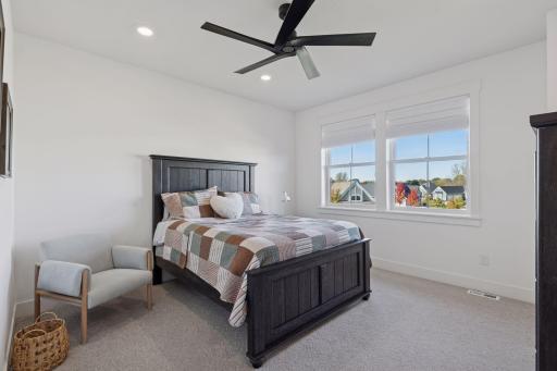 Spacious upper level bedroom with walk-in closet.