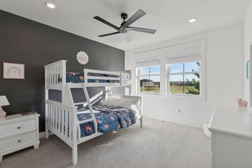 A second bedroom with en suite bathroom provides comfort and privacy for family or guests.