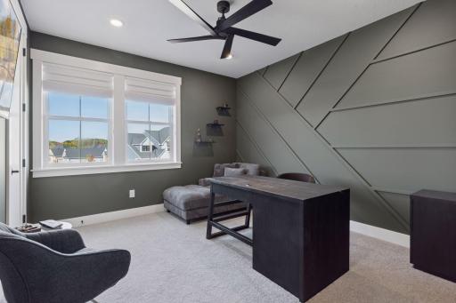 This upper level bedroom is currently being used as a second home office - the perfect blend of design and function!