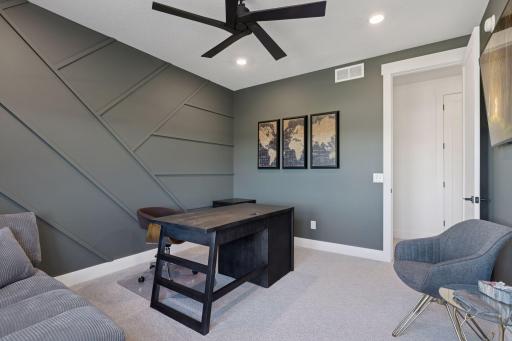 This upper level bedroom is currently being used as a second home office - the perfect blend of design and function!