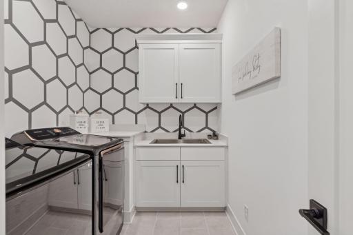 Laundry is no longer a chore in this impeccably designed laundry room.