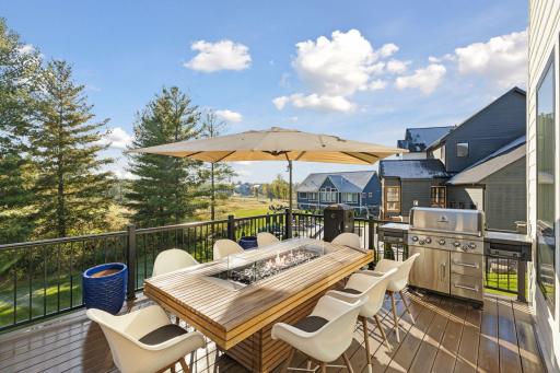 The expansive deck overlooks the golf course - a highlight when entertaining or enjoying coffee in the morning!