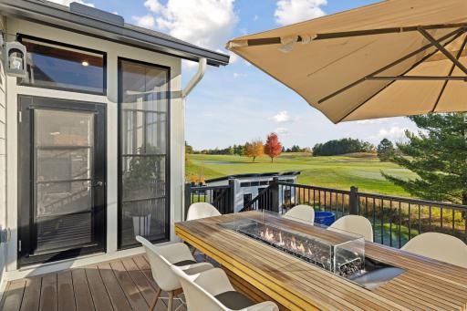 The expansive deck overlooks the golf course - a highlight when entertaining or enjoying coffee in the morning!