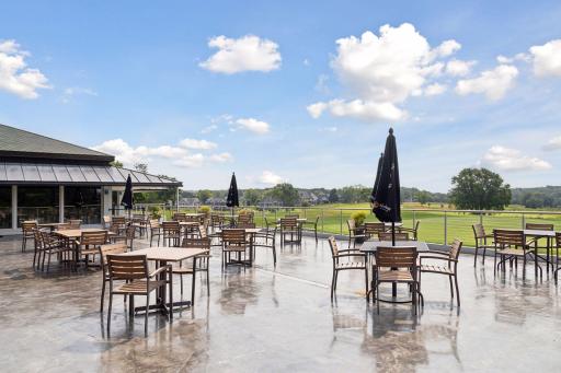 Enjoy time with friends and neighbors on the Club's outdoor patio.