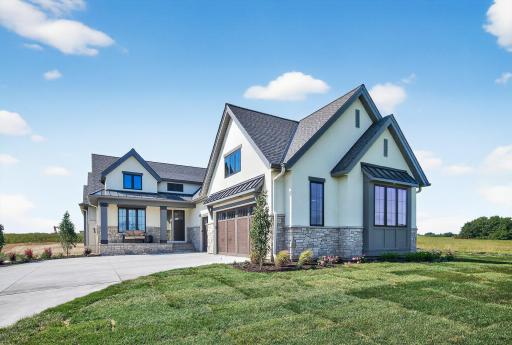 Photo of previous model home by Wooddale Builders.jpg