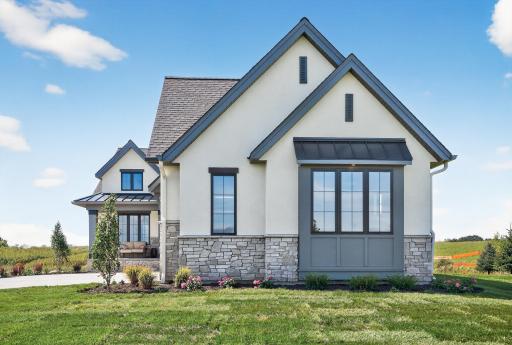 Photo of previous model home by Wooddale Builders.jpg