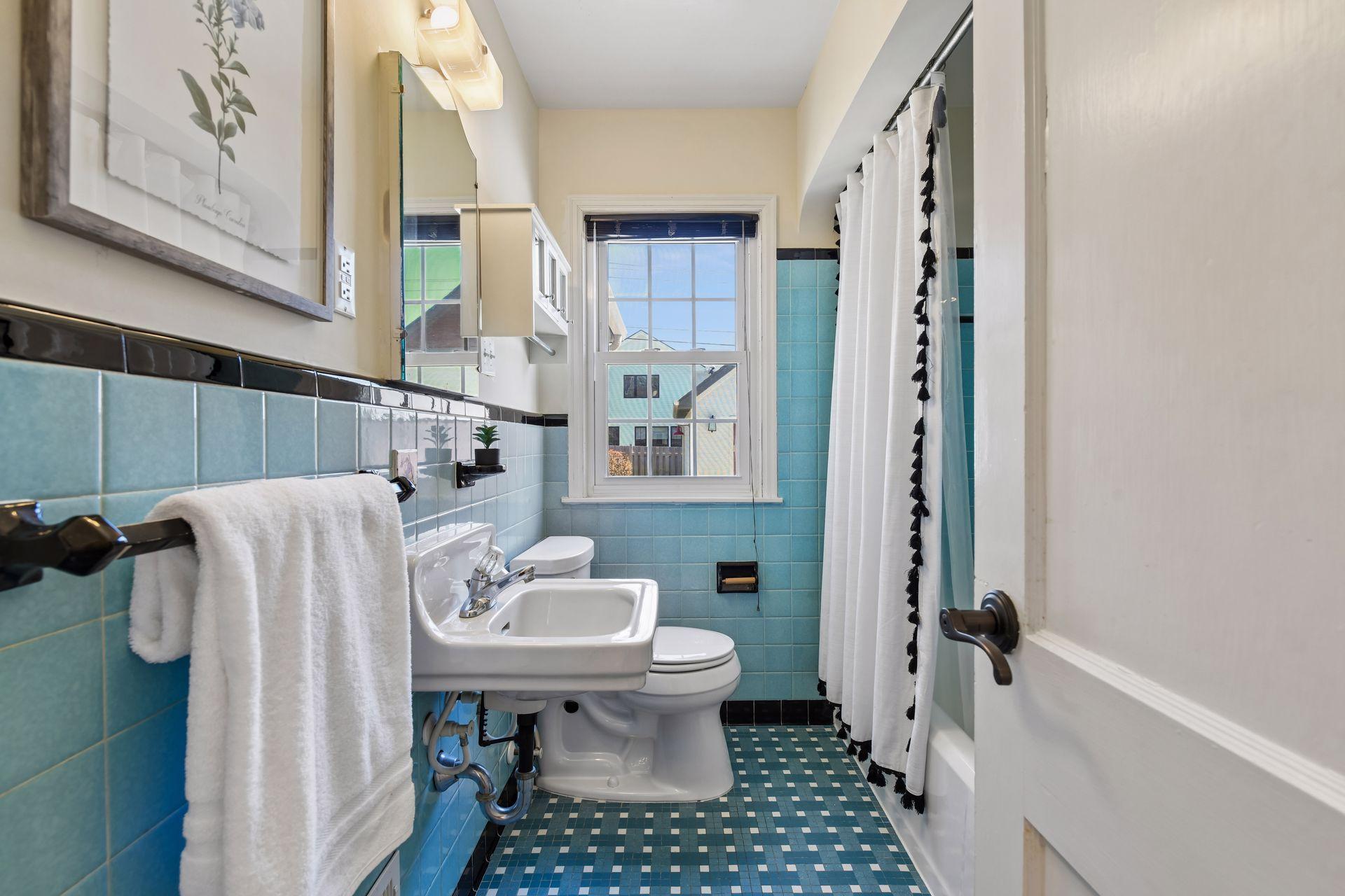 Gorgeous, vintage tile in the main floor full bathroom.