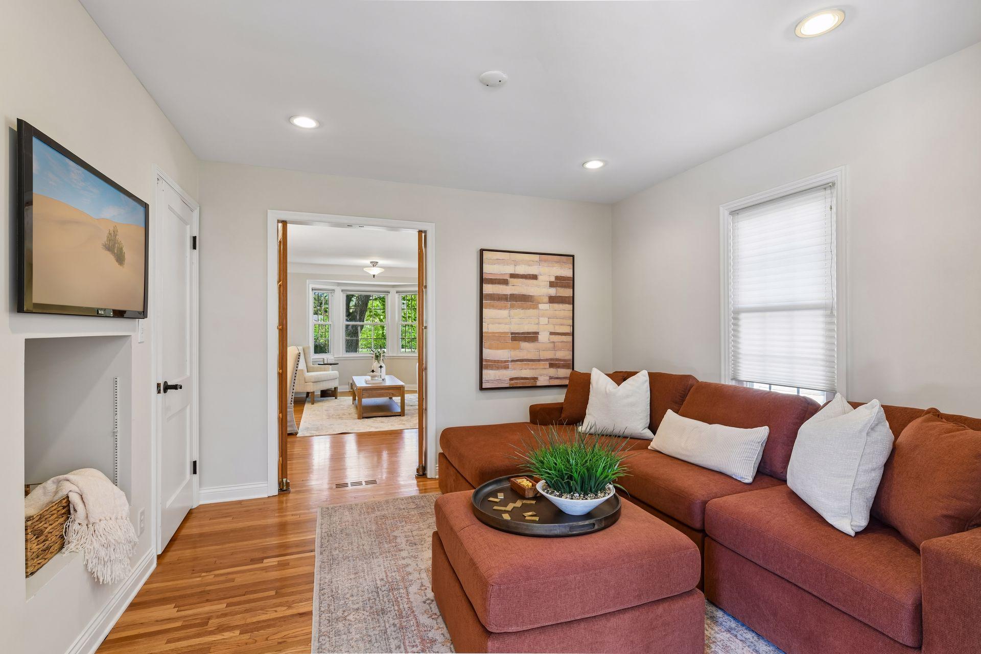 French door close off the den from formal living room.