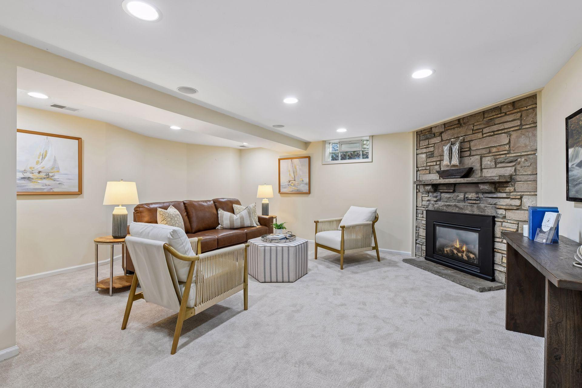 Cozy lower level living room with gas fireplace.
