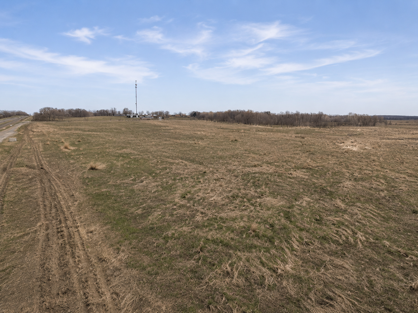Ai'd photo removing snow and greening up grass