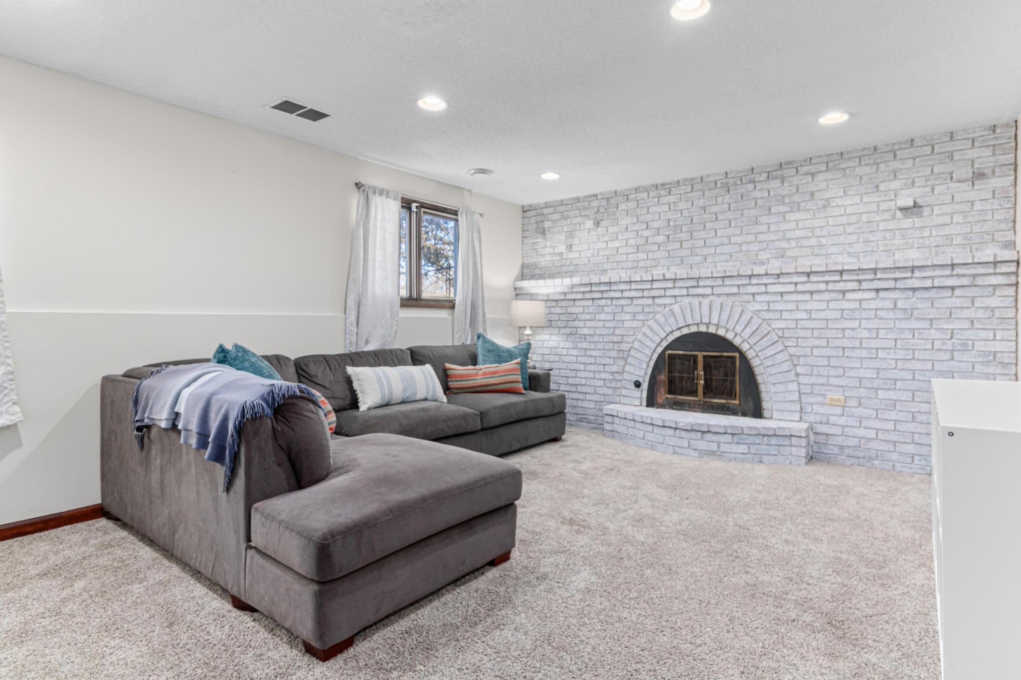 Wood-burning fireplace in lower level
