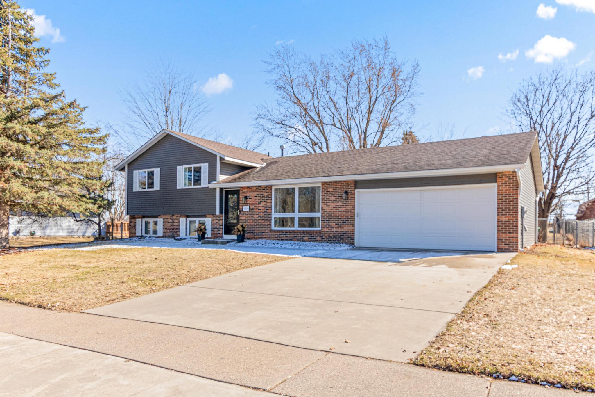 Front of home - cement driveway