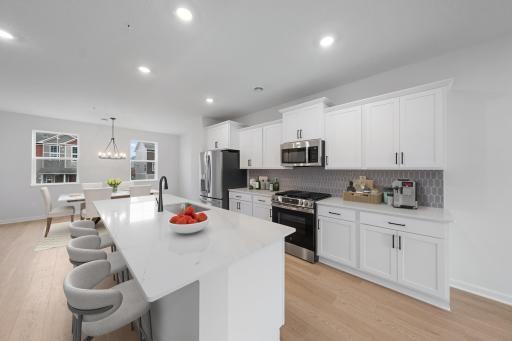 Light and bright! The kitchen has timeless finishes that blend an elevated feel with functionality.