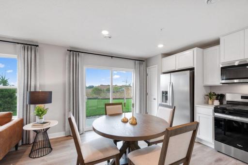 Enjoy summer evening relaxing on your patio. Photo is of model home. Colors and options may vary. Ask Sales Agent for details.