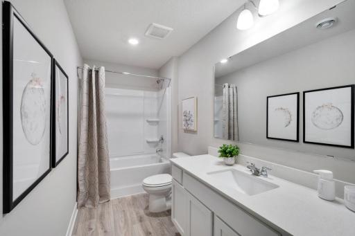 Upper level, hall bath. Photo is of model home. Colors and options may vary. Ask Sales Agent for details.