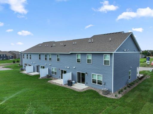 Rear of homes at Ardan Place in Rosemount. Every home has a private patio.