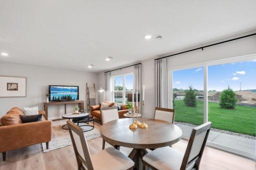 Durable and elegant LVP flooring throughout main areas for easy upkeep. Photo is of model home. Colors and options may vary. Ask Sales Agent for details.