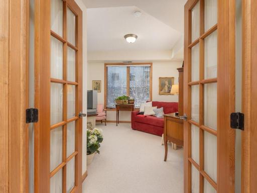 French doors lead to bedroom ... currently set up as a den.