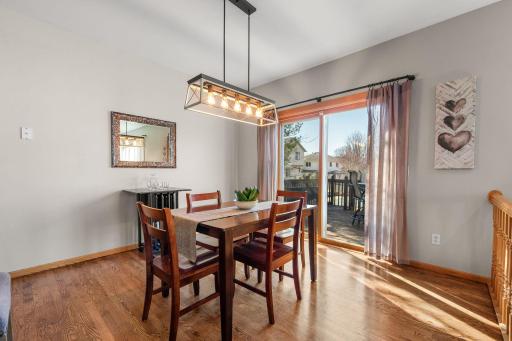 Informal dining room has gorgeous flooring and sliders that lead you out to a spacious deck.