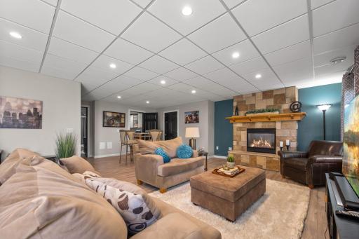 The lower level family room is bright and airy - and features a 2nd gas fireplace.
