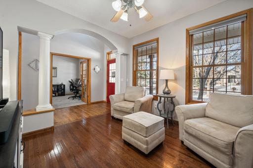 As you enter this gorgeous home, gleaming hardwood floors carry through much of the first level.