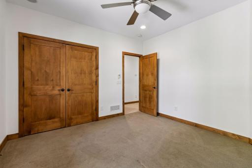 3rd bedroom has a large closet and ceiling fan.