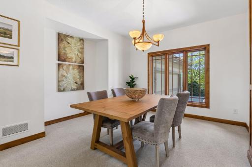 Elegant formal dining room with a charming alcove perfect for a buffet.