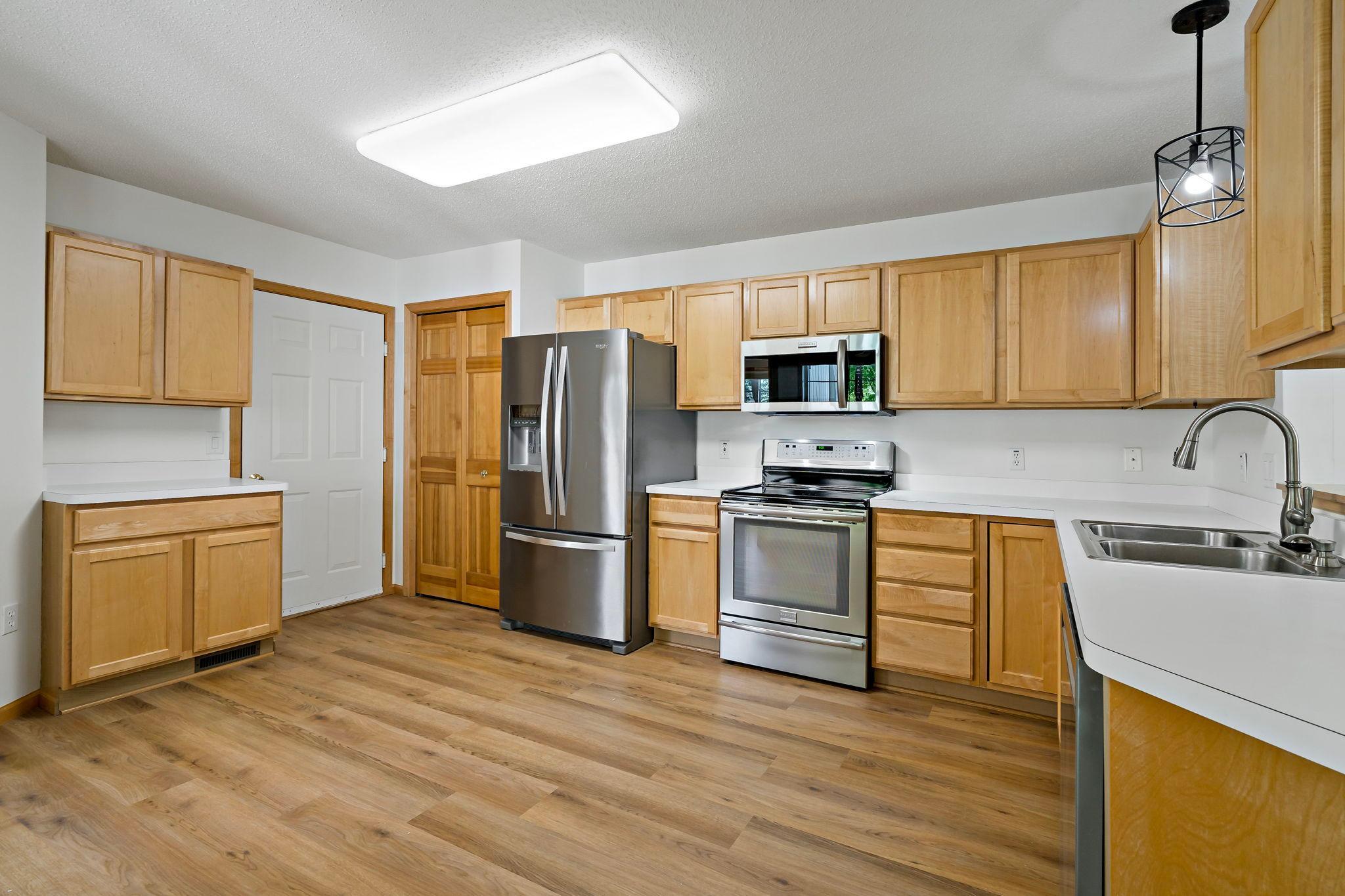 Kitchen: Garage Door Entrance-763 Lake Ridge Dr Woodbury MN_0013.jpg