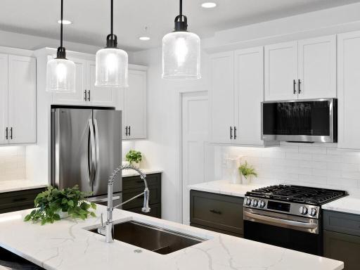 Check out those pendant lights over the center island!