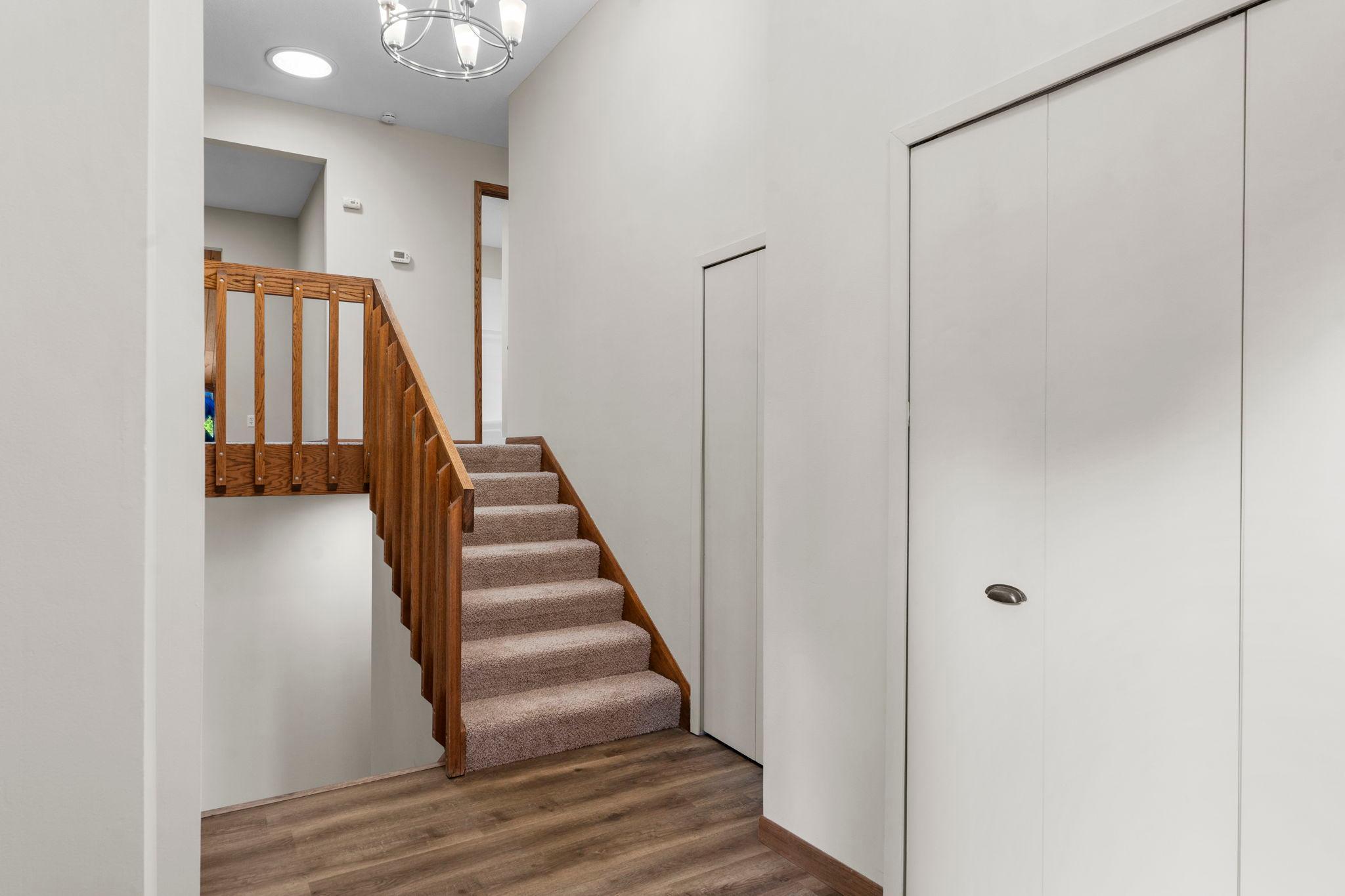Large foyer with enormous closet is an organizer and a stow-and-go dream!