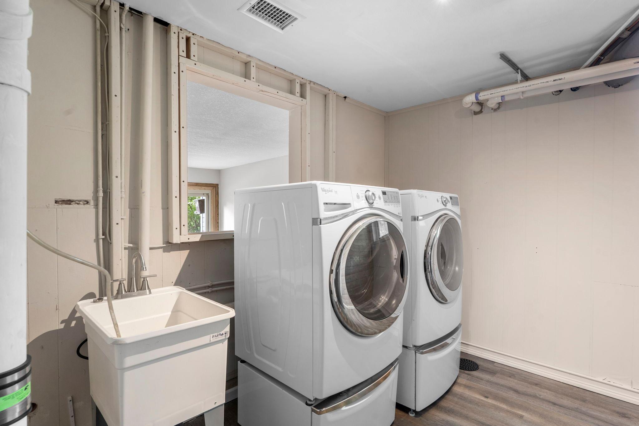 Large laundry with an extra fridge