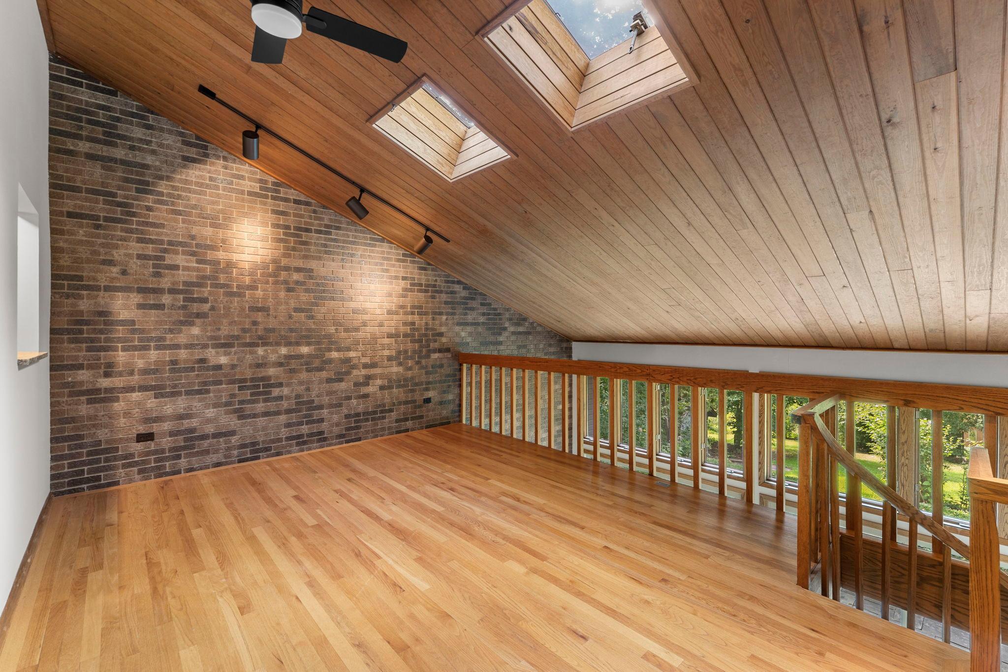 Flex: Dining or living room full of natural light overlooking nature