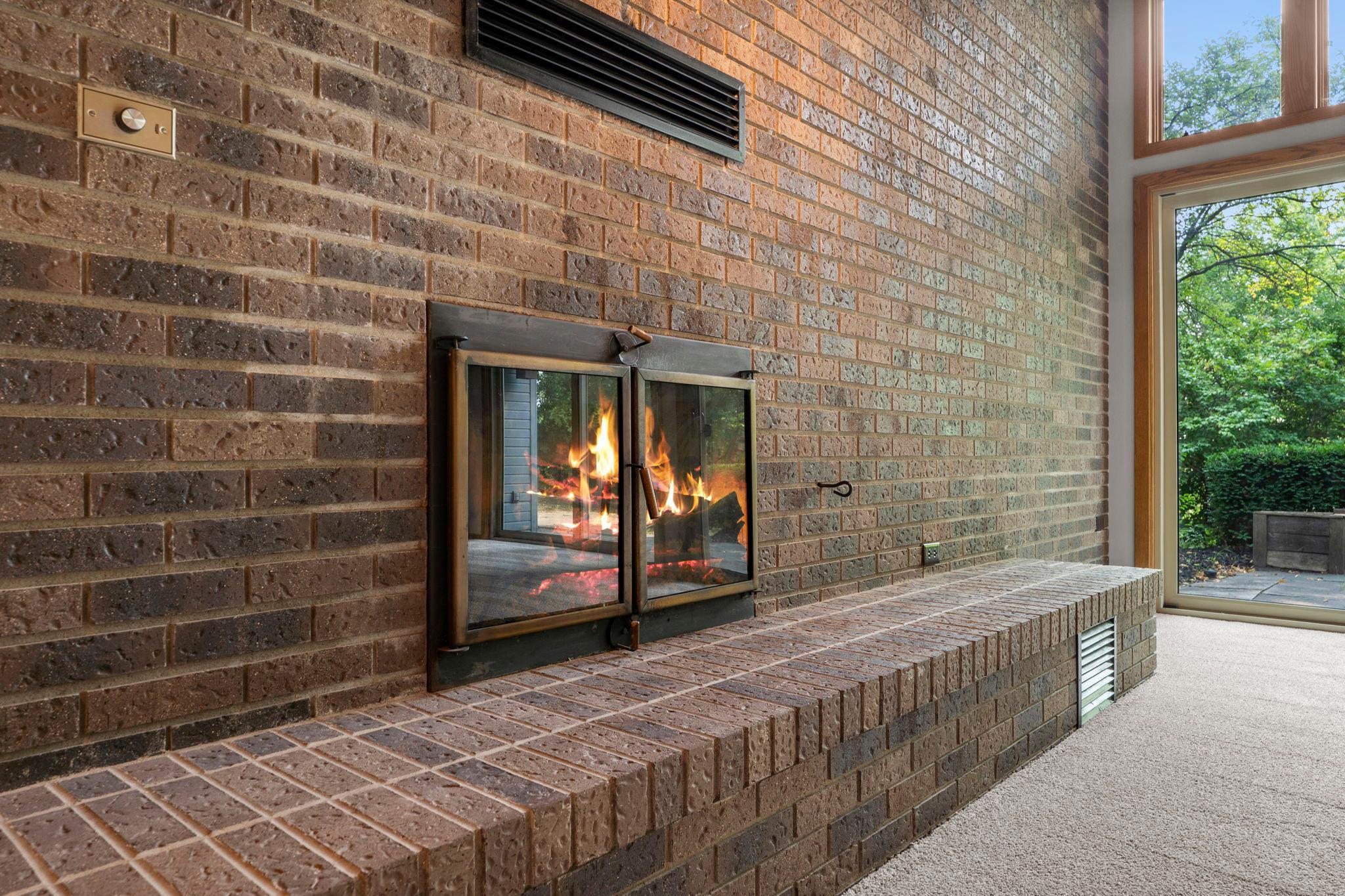 Two story brick fireplace