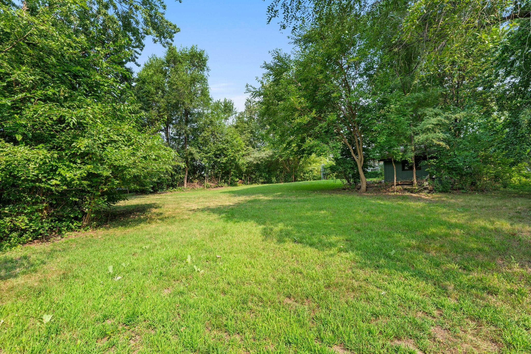 Over 1/2 an acre of green space and mature trees