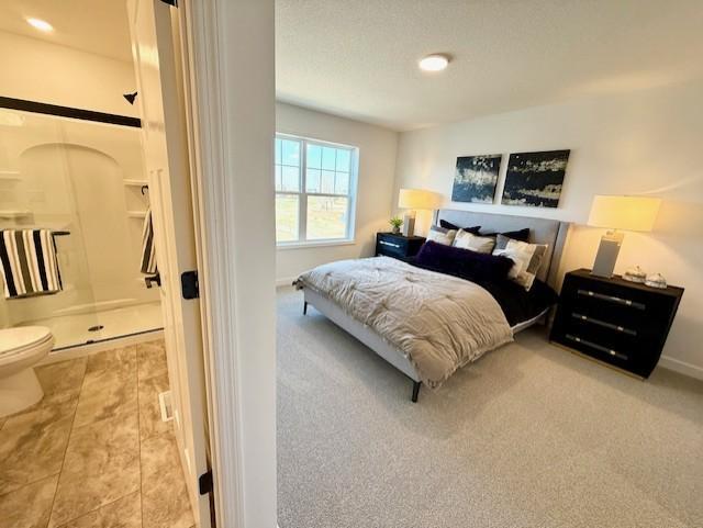 (Actual photo of the home) One of three secondary bedrooms on the upper level