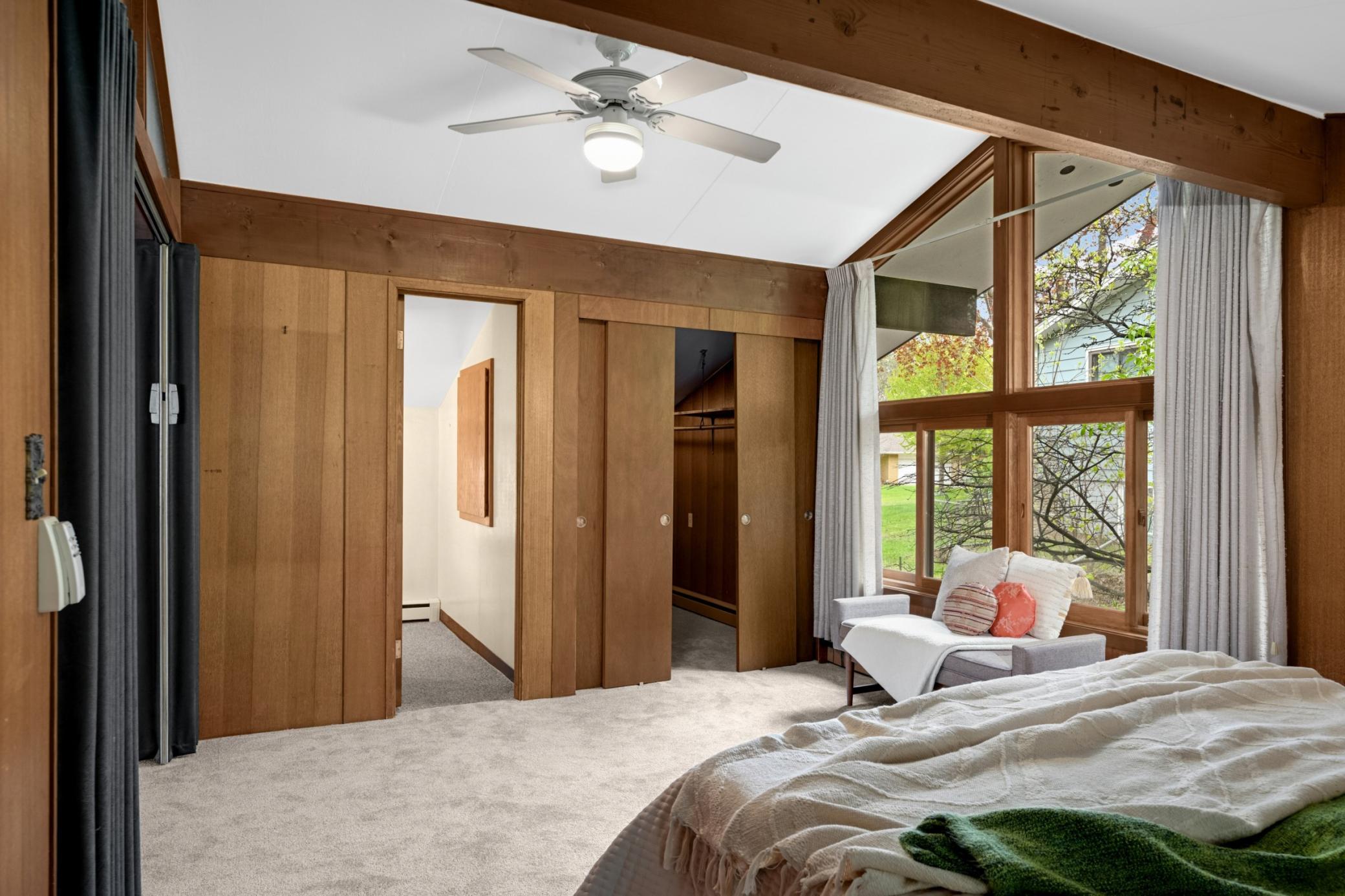 Walk in closet in primary bedroom