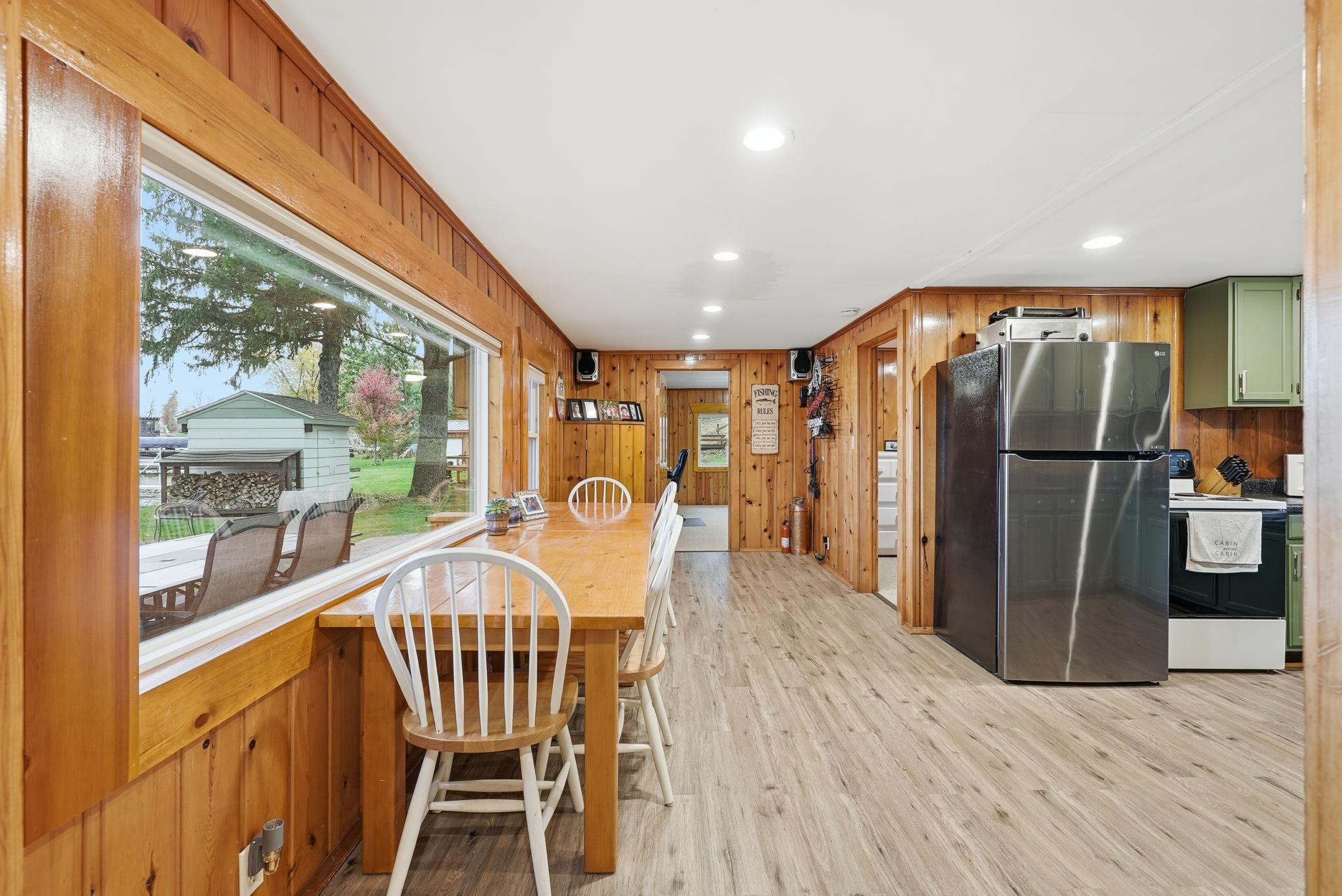 Kitchen / dining room overlooks your back deck and lake!