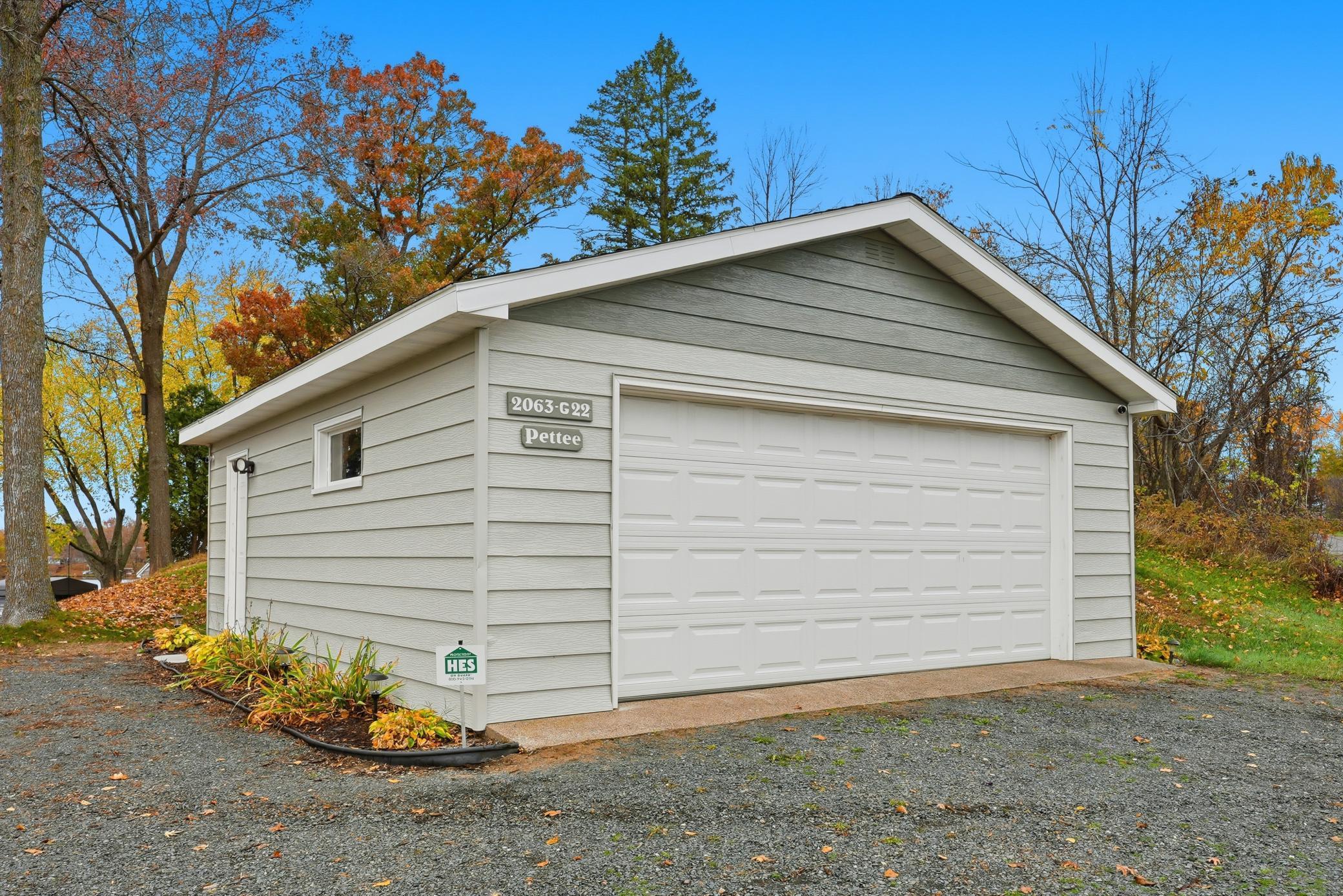 Detached garage for vehicles and lake toys.