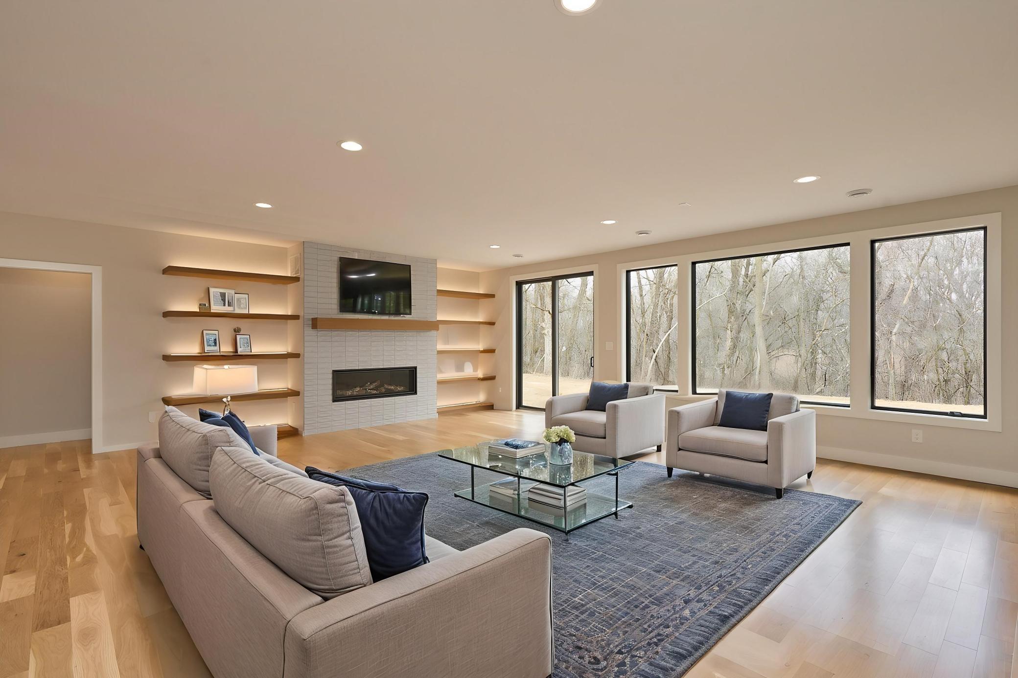 Lower level great room with expansive windows and walkout - AIG