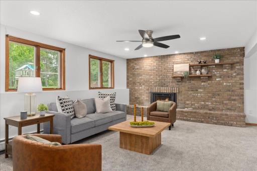 Lower level family room with gas fireplace.