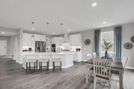 Welcome home to DR Horton's Whitney floor plan in Caramore Crossing! This stunning kitchen will leave a lasting impression on you AND your guests! Model photos. Options and colors will vary.