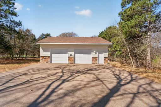 Detached 30x34 garage with own driveway off Coon Creek