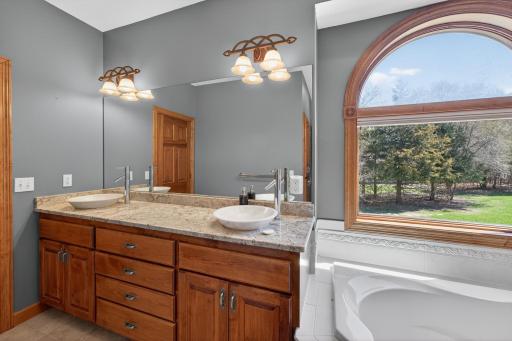 Primary Bathroom double sinks granite counter top