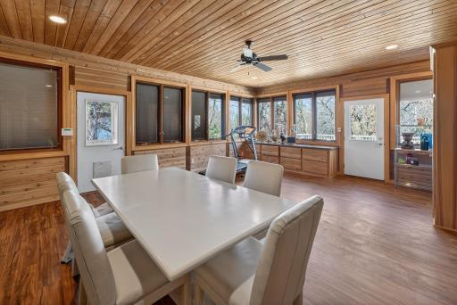 4 season porch with doors access to back yard via deck or side door with doggy door