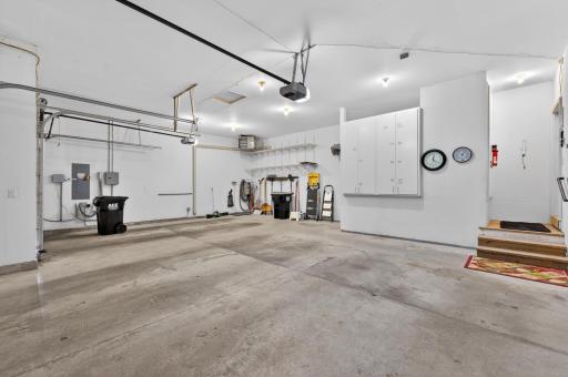 Attached 3 car garage wtih lots of storage heated and finished
